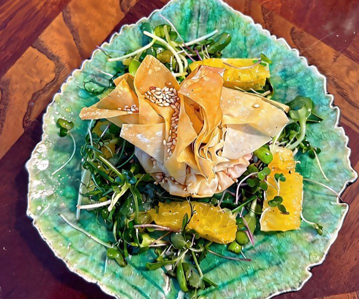 Crisp filo parcel with orange and fresh shoots, one of the dishes you will cook